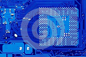 Blue circuit board background of computer motherboard,Electronic computer hardware technology.Integrated communication processor.