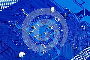 Blue circuit board background of computer motherboard,Electronic computer hardware technology.Integrated communication processor.