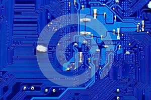 Blue circuit board background of computer motherboard,Electronic computer hardware technology.Integrated communication processor.