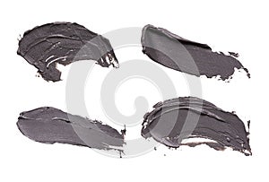 Blue clay facial mask smear on white isolated background