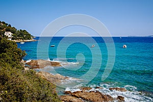 Blue clear sea water Le Lavandou - vacation destination in Franc