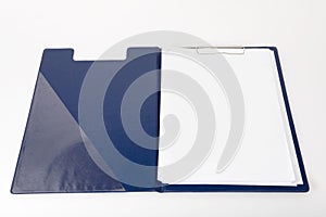 Blue clipboard with blank sheets