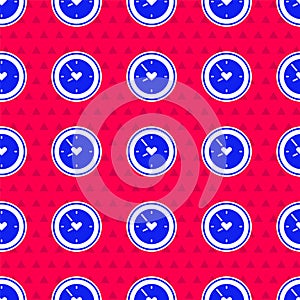 Blue Clock with heart icon isolated seamless pattern on red background. Valentines day. Love symbol. Vector