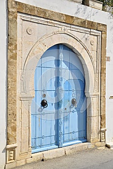 Blue closed tunisian doors