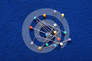 Blue cloth background fabric and color needles