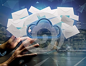 Blue cloud surrounded by realistic envelope email displayed on a