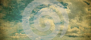 Blue cloudy sky background in vintage style