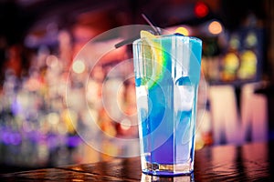 Blue cocktail on the bar photo