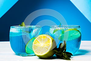 Blue cocktails decorated with lemon