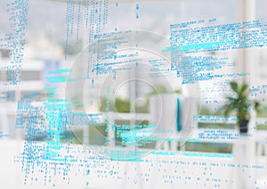 Blue code against blurry white office