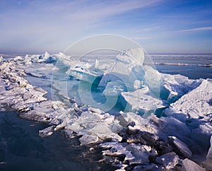 Blue and cold ice of Lake Baikal. Hummocks