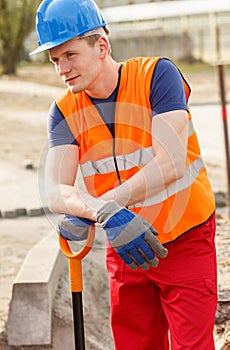 Blue collar worker standing