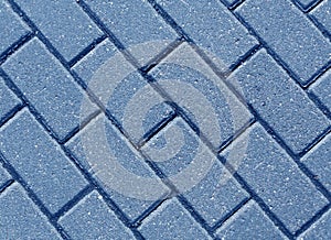 Blue color cobblestone pavement close-up