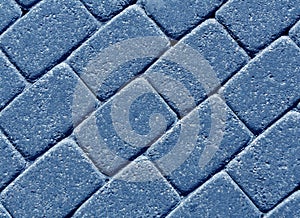 Blue color cobblestone pavement surface.