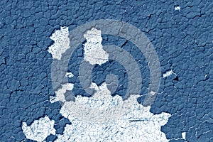 Blue color cracked painted wall pattern.