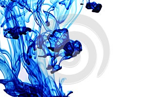 Blue Color drops in water White background