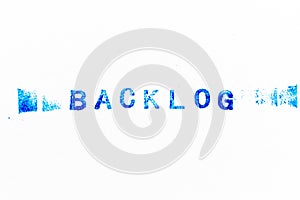 Blue ink of rubber stamp in word backlog on white paper background photo