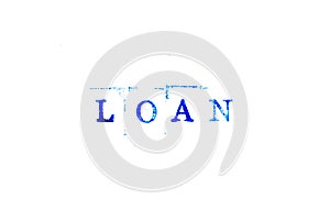 Blue ink of rubber stamp in word loan on white paper background