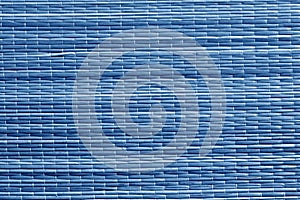 Blue color straw mat surface.