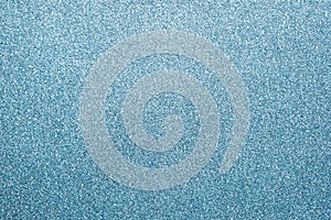 Blue colored glitter paper texture or vintage background