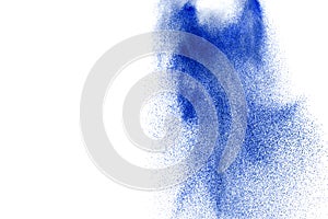 Blue colored sand explosion isolated on white background.