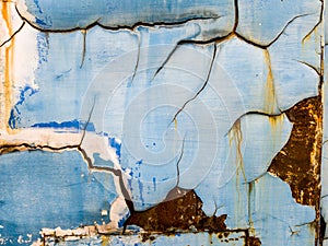 Blue colour painting peel off with rusty steel plate background