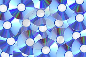 Blue compact discs close up background
