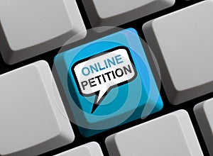 Speech Bubble on Computer Keyboard showing Online Petition photo