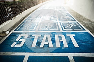 Blue concrete runway, walkway and jogging way