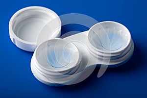 Blue contact lens in container