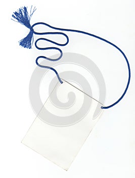 Blue cord with a knot, blank label and string isolated on white background.