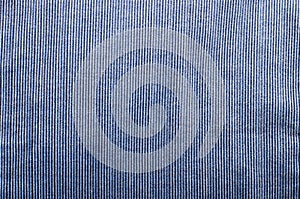 Blue corduroy fabric texture close- up photo background