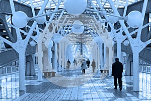 Blue corridor, spheres and people