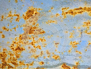 Blue corroded metal surface with spots of rust. Grunge metal background
