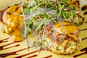 Blue crab cakes with balsamic glaze