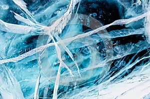 Blue cracked surface of the ice surface