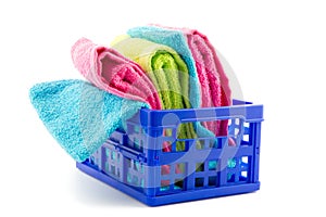 Blue crate filled with towels