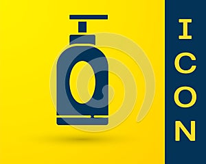 Blue Cream or lotion cosmetic tube icon isolated on yellow background. Body care products for men. Vector Illustration