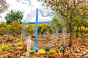 Blue Cross at Apparition Mountain in Medjugorje photo