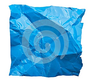Blue crumpled paper with folds texture cut out on white background
