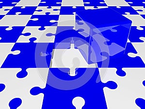 Blue cube on puzzle pieces in blue and white colors