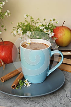 Blue Cup of Coffee milk hot drink cinnamon sticks Books Red Apples Camomile Flower Buquet