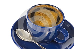 Blue cup with coffee on white background.