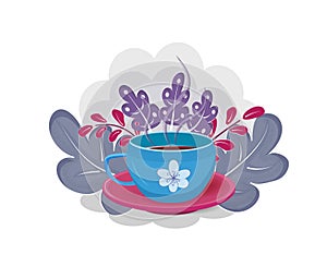 Blue cup with tea on a red saucer surrounded by foliage