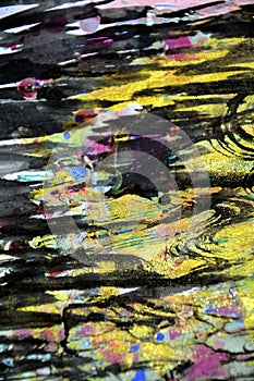 Golden dark yellow black waves splashes, colorful vivid waxy colors, contrasts creative background