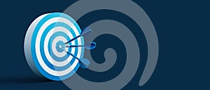 Blue darts arrows in the center of the shooting target. Business targeting and winning concept on dark blue background