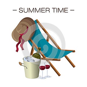 Blue deckchair with a wide-brimmed summer hat hanging on it. Bucket cooler for wine with bottle and two glasses with drink