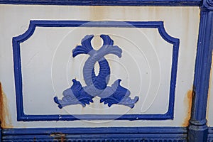 Blue decorative pattern in the shape of fish. View of Eastbourne Pier, East Sussex England UK