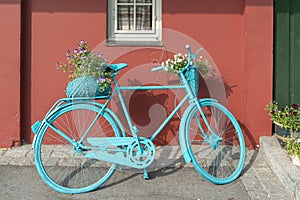 Blue decrative bicycle with flowers, Norway