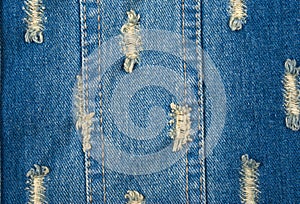 Blue denim background of rough cloth